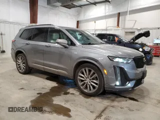 2020 Cadillac XT6 AWD Sport with VIN 1GYKPGRS5LZ145966, listed as a Copart auction lot 66585334 with 76,735 mi miles and Salvage Title. Bid and sale history available at carsss.com. Image 4.