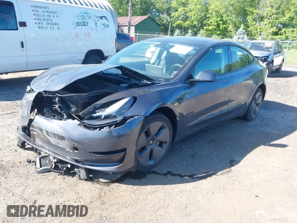 2023 Tesla Model 3 z VIN 5YJ3E1EA2PF492659, wystawiony jako IAAI lot #42284833 z przebiegiem 41 205 mil mil oraz . Historia ofert i sprzedaży dostępna na DreamBid. Obrazek 2.