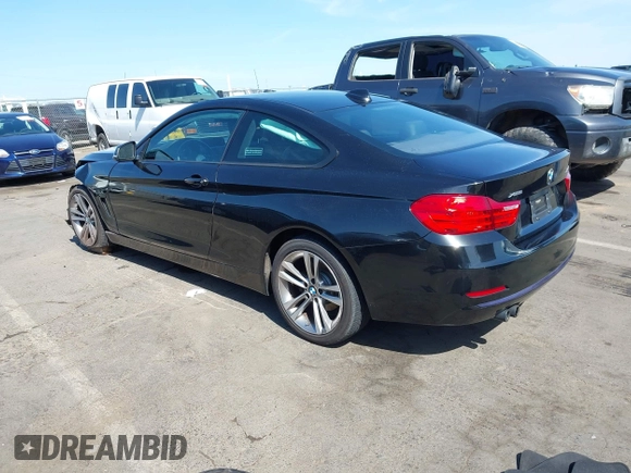 2014 BMW 4 Series 428i xDrive with VIN WBA3N9C53EK244907, listed as a IAAI auction lot 42380025 with 71,431 mi miles and . Bid and sale history available at DreamBid. Image 3.