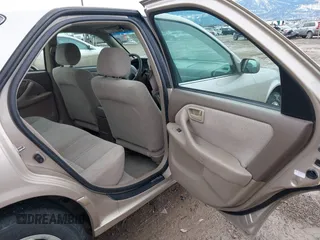 2001 Toyota Camry CE with VIN 4T1BG22K51U860223, listed as a IAAI auction lot 41650629 with 219,328 mi miles. Bid and sale history available at carsss.com. Image 8.