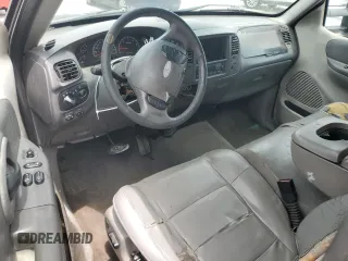 2003 Ford F-150 XL with VIN 2FTRX17L83CA53082, listed as a Copart auction lot 63836305 with 219,269 mi miles and Salvage title. Bid and sale history available at DreamBid. Image 8.