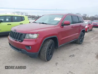 2013 Jeep Grand Cherokee Laredo with VIN 1C4RJEAG4DC573971, listed as a IAAI auction lot 41627288 with 143,256 mi miles. Bid and sale history available at carsss.com. Image 17.