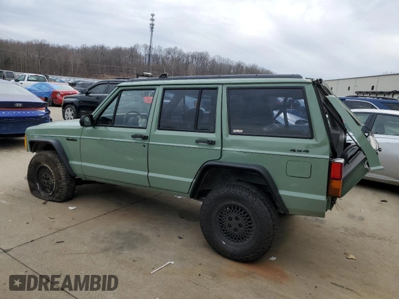 1996 Jeep Cherokee Country with VIN 1J4FJ78S3TL180304, listed as a Copart auction lot 45291925 with 162,876 mi miles and Salvage Title. Bid and sale history available at carsss.com. Image 2.