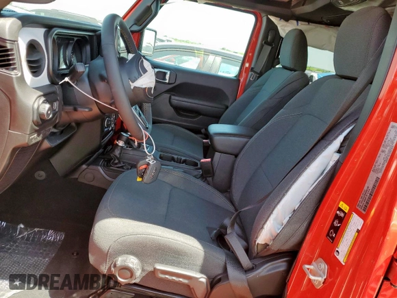 2024 Jeep Wrangler Sport S with VIN 1C4PJXDG3RW253142, listed as a Copart auction lot 52560035 with 2,667 mi miles and Salvage title. Bid and sale history available at DreamBid. Image 7.