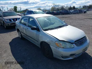 2003 Toyota Corolla CE with VIN 1NXBR32E23Z015648, listed as a IAAI auction lot 42056596 with 287,999 mi miles and . Bid and sale history available at DreamBid. Image 1.