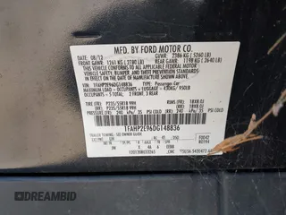 2013 Ford Taurus SEL with VIN 1FAHP2E96DG148836, listed as a IAAI auction lot 42030387 with 192,218 mi miles and . Bid and sale history available at carsss.com. Image 9.