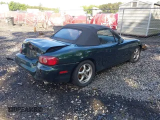 2001 Mazda MX-5 Miata with VIN JM1NB353010203783, listed as a IAAI auction lot 42255348 with 139,080 mi miles and . Bid and sale history available at DreamBid. Image 4.