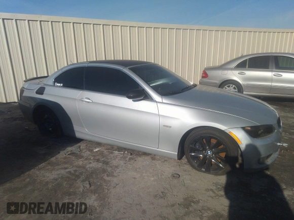 2007 BMW 3 Series 335i with VIN WBAWL73587PX49287, listed as a IAAI auction lot 41454028 with 182,630 mi miles. Bid and sale history available at carsss.com. Image 12.