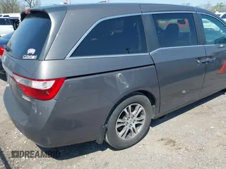2013 Honda Odyssey EX-L with VIN 5FNRL5H65DB011071, listed as a IAAI auction lot 41992265 with 192,624 mi miles and . Bid and sale history available at DreamBid. Image 4.