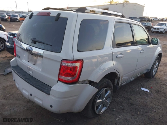 2011 Ford Escape Limited with VIN 1FMCU0E72BKA06425, listed as a IAAI auction lot 41095359 with 174,075 mi miles. Bid and sale history available at carsss.com. Image 4.
