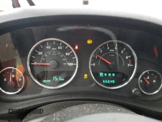 2012 Jeep Wrangler Unlimited Sport with VIN 1C4BJWDG6CL234419, listed as a Copart auction lot 62284825 with 66,649 mi miles and Salvage title. Bid and sale history available at DreamBid. Image 9.