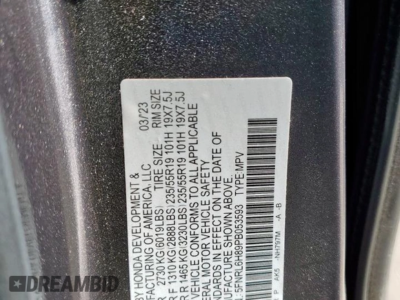 2023 Honda Odyssey Touring with VIN 5FNRL6H89PB053593, listed as a Copart auction lot 64836685 with 26,568 mi miles and Salvage title. Bid and sale history available at DreamBid. Image 12.