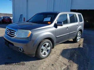 2015 Honda Pilot EX-L with VIN 5FNYF4H57FB063115, listed as a IAAI auction lot 41248234 with 187,752 mi miles and . Bid and sale history available at carsss.com. Image 2.