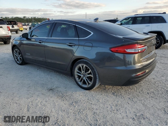 2019 Ford Fusion Hybrid Titanium with VIN 3FA6P0RU3KR138040, listed as a Copart auction lot 70843932 with 68,133 mi miles. Bid and sale history available at carsss.com. Image 2.