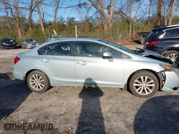 2012 Honda Civic EX-L with VIN 2HGFB2F91CH507657, listed as a IAAI auction lot 41115627 with 253,242 mi miles and . Bid and sale history available at DreamBid. Image 13.