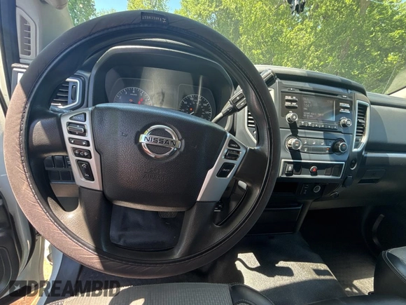2017 Nissan Titan SV with VIN 1N6AA1EJ7HN539154, listed as a Copart auction lot 55880185 with 133,933 mi miles and Clean Title. Bid and sale history available at DreamBid. Image 9.