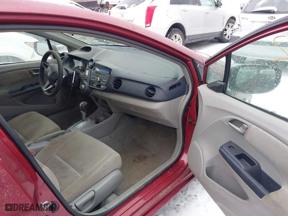 2010 Honda Insight LX with VIN JHMZE2H51AS004907, listed as a IAAI auction lot 41259182 with 76,494 mi miles. Bid and sale history available at carsss.com. Image 5.