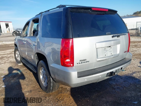 2013 GMC Yukon SLT with VIN 1GKS1CE04DR180881, listed as a IAAI auction lot 41647032 with 187,228 mi miles. Bid and sale history available at carsss.com. Image 3.