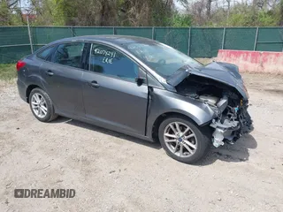 2017 Ford Focus SE with VIN 1FADP3F20HL335881, listed as a IAAI auction lot 42074241 with 127,741 mi miles. Bid and sale history available at carsss.com. Image 1.