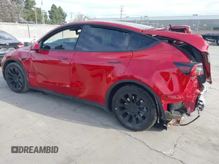 2023 Tesla Model Y Long Range with VIN 7SAYGAEE7PF713761, listed as a IAAI auction lot 41638067 with 46,089 mi miles and . Bid and sale history available at DreamBid. Image 3.
