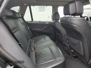 2012 BMW X5 35i with VIN 5UXZV4C57CL765053, listed as a Copart auction lot 59997275 with 157,943 mi miles and Salvage title. Bid and sale history available at DreamBid. Image 11.