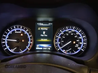 2015 Infiniti Q50 Premium with VIN JN1BV7AP2FM345954, listed as a IAAI auction lot 41514027 with 79,957 mi miles. Bid and sale history available at carsss.com. Image 7.