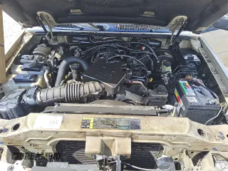 2004 Ford Explorer Sport Trac XLS z VIN 1FMZU77K64UA90633, wystawiony jako Copart lot #54862215 z przebiegiem 274 354 mil mil oraz Czysty tytuł • Clean title. Historia ofert i sprzedaży dostępna na DreamBid. Obrazek 11.