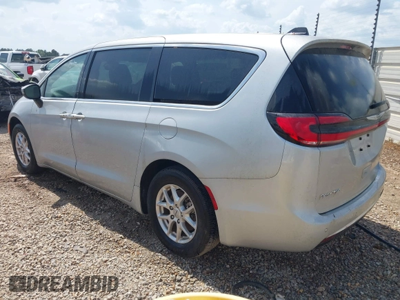 2023 Chrysler Pacifica Touring L with VIN 2C4RC1BG7PR521232, listed as a IAAI auction lot 42087909 with 34,609 mi miles and . Bid and sale history available at DreamBid. Image 3.