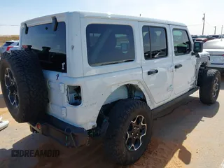 2023 Jeep Wrangler Rubicon with VIN 1C4JJXR63PW580370, listed as a IAAI auction lot 42017282 with 31,823 mi miles and . Bid and sale history available at DreamBid. Image 4.
