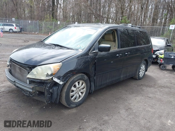 2009 Honda Odyssey EX-L with VIN 5FNRL387X9B051750, listed as a IAAI auction lot 41953221 with 205,142 mi miles. Bid and sale history available at carsss.com. Image 18.