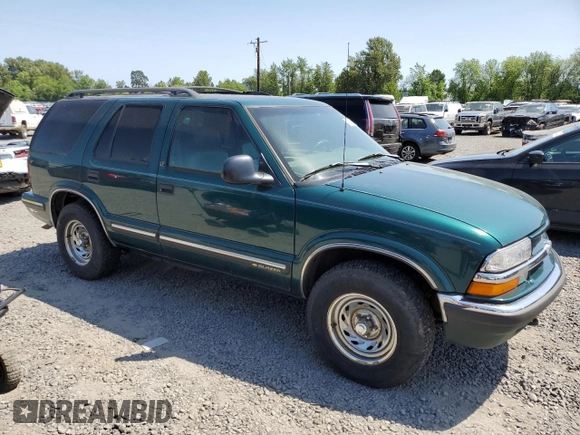 1998 Chevrolet Blazer LS with VIN 1GNDT13W5W2184533, listed as a Copart auction lot 59441555 with 124,339 mi miles and Clean title. Bid and sale history available at DreamBid. Image 4.