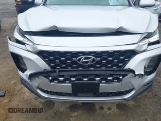 2019 Hyundai Santa Fe SE z VIN 5NMS23AD4KH130517, wystawiony jako IAAI lot #42324854 z przebiegiem 76 963 mil mil oraz . Historia ofert i sprzedaży dostępna na DreamBid. Obrazek 6.