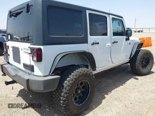 2013 Jeep Wrangler Unlimited Sport with VIN 1C4BJWDGXDL694054, listed as a IAAI auction lot 42097708 with 130,360 mi miles and . Bid and sale history available at DreamBid. Image 4.