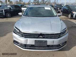 2017 Volkswagen Passat 1.8T SE w/Technology with VIN 1VWGT7A34HC071376, listed as a IAAI auction lot 41568542 with 93,974 mi miles. Bid and sale history available at carsss.com. Image 12.