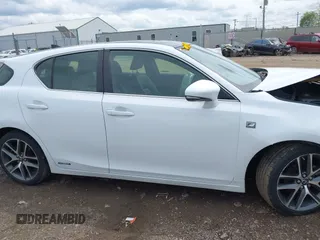 2014 Lexus CT 200h z VIN JTHKD5BH4E2198864, wystawiony jako IAAI lot #42083972 z przebiegiem 148 555 mil mil oraz . Historia ofert i sprzedaży dostępna na DreamBid. Obrazek 13.
