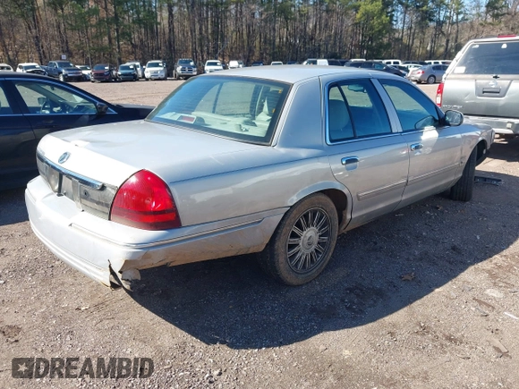 2010 Mercury Grand Marquis LS z VIN 2MEBM7FV6AX633712, wystawiony jako IAAI lot #41575052 z przebiegiem 183 898 mil mil oraz . Historia ofert i sprzedaży dostępna na DreamBid. Obrazek 4.