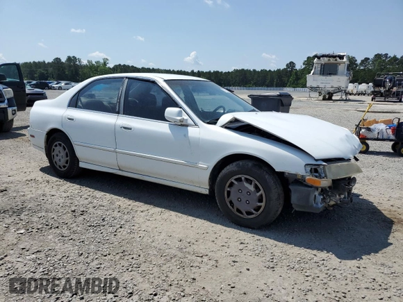 1994 Honda Accord с VIN 1HGCD5642RA166652, выставлен на аукционе Copart как лот 57225365 с пробегом 247 643 миль миль и Списание • Salvage title. История ставок и продаж доступна на DreamBid. Изображение 4.
