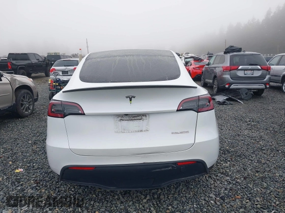 2023 Tesla Model Y Performance z VIN 7SAYGDEF2PF917295, wystawiony jako IAAI lot #41260852 z przebiegiem 23 295 mil mil oraz . Historia ofert i sprzedaży dostępna na DreamBid. Obrazek 16.