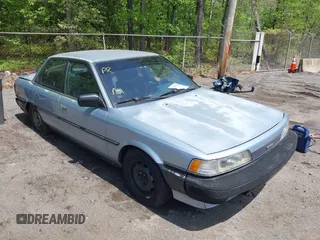 1988 Toyota Camry z VIN JT2SV21E1J3181554, wystawiony jako IAAI lot #42158520 z przebiegiem 167 012 mil mil oraz . Historia ofert i sprzedaży dostępna na DreamBid. Obrazek 1.