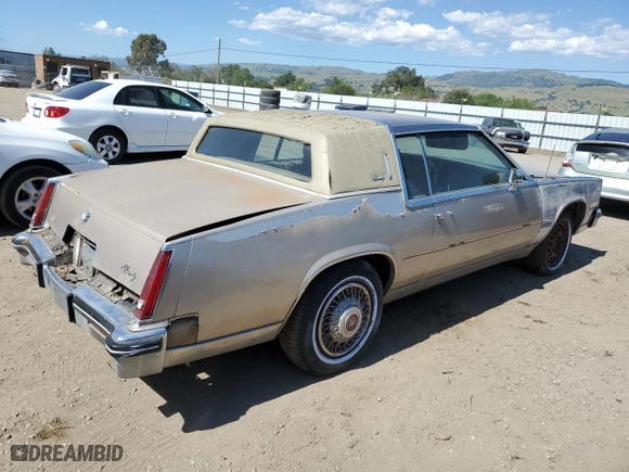 1985 Cadillac Eldorado with VIN 1G6EL578XFE661216, listed as a Copart auction lot 54606984 with NaN miles and Salvage Title. Bid and sale history available at carsss.com. Image 3.