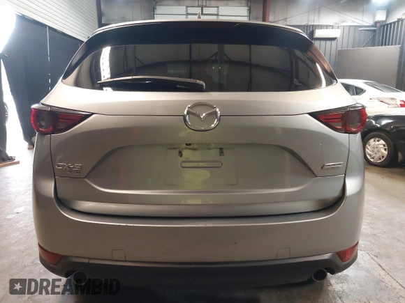 2019 Mazda CX-5 Grand Touring with VIN JM3KFBDM9K0621246, listed as a IAAI auction lot 42005391 with 45,687 mi miles. Bid and sale history available at carsss.com. Image 17.