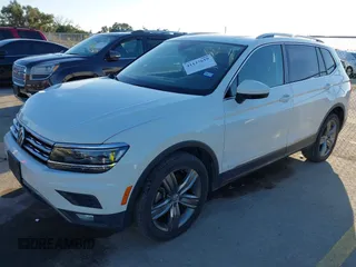 2018 Volkswagen Tiguan SEL Premium with VIN 3VV5B7AX2JM202908, listed as a IAAI auction lot 41137619 with 84,323 mi miles and . Bid and sale history available at DreamBid. Image 2.