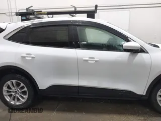 2020 Ford Escape SE z VIN 1FMCU9G62LUB80302, wystawiony jako IAAI lot #42610731 z przebiegiem 43 873 mil mil oraz . Historia ofert i sprzedaży dostępna na DreamBid. Obrazek 13.