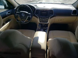 2018 Jeep Grand Cherokee Altitude with VIN 1C4RJFAG2JC258264, listed as a Copart auction lot 55262915 with 102,633 mi miles and Salvage title. Bid and sale history available at DreamBid. Image 8.