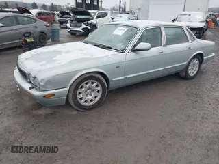 1998 Jaguar XJ with VIN SAJHN1242WC819689, listed as a IAAI auction lot 41148530 with 60,143 mi miles and . Bid and sale history available at DreamBid. Image 17.
