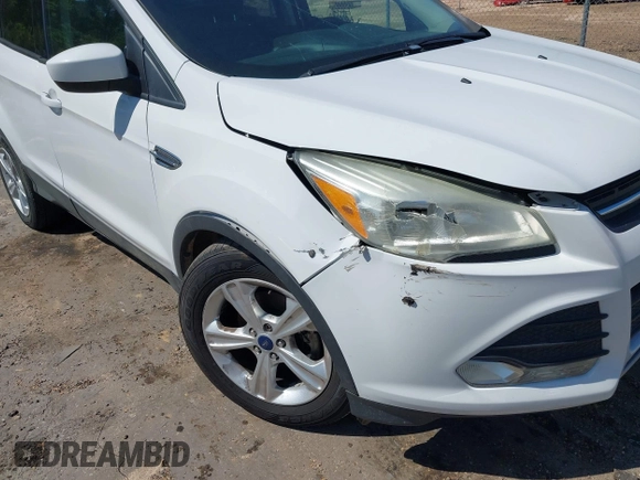 2015 Ford Escape SE with VIN 1FMCU0GX6FUC82629, listed as a IAAI auction lot 42039705 with 157,061 mi miles. Bid and sale history available at carsss.com. Image 6.