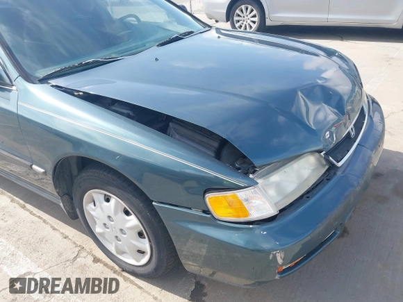 1996 Honda Accord LX with VIN 1HGCD5636TA182464, listed as a IAAI auction lot 41867521 with 191,832 mi miles and . Bid and sale history available at carsss.com. Image 20.