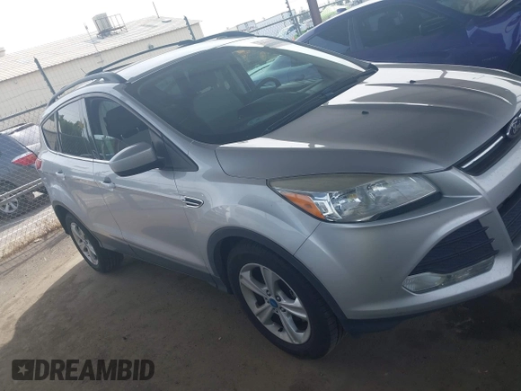 2013 Ford Escape SE with VIN 1FMCU0GX5DUB97293, listed as a IAAI auction lot 42044696 with 182,746 mi miles and . Bid and sale history available at DreamBid. Image 13.