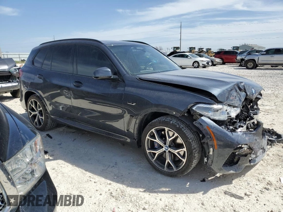 2022 BMW X5 xDrive45e with VIN 5UXTA6C0XN9M79182, listed as a Copart auction lot 48599195 with 31,219 mi miles and Salvage Title. Bid and sale history available at carsss.com. Image 4.