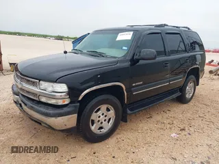 2002 Chevrolet Tahoe LT with VIN 1GNEC13Z72R176028, listed as a IAAI auction lot 41897050 with 216,553 mi miles. Bid and sale history available at carsss.com. Image 2.